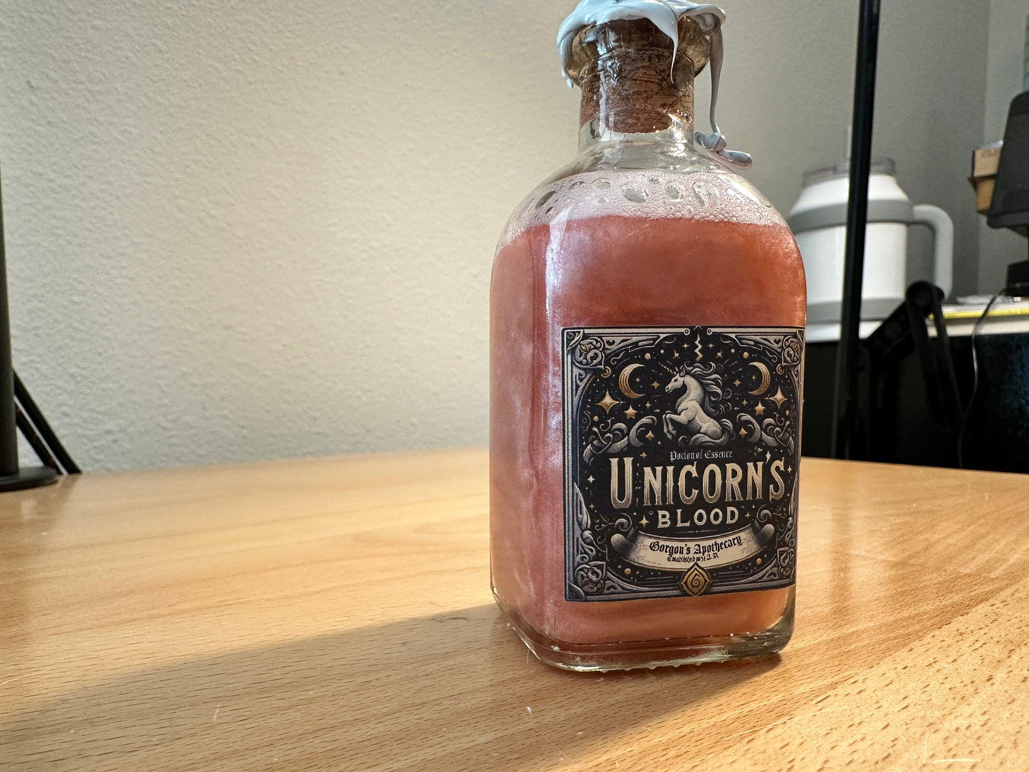 Unicorn Blood: A Potion of Essence - Enigmatic Silver-Red Swirling Decor Vial by Gorgon's Apothecary