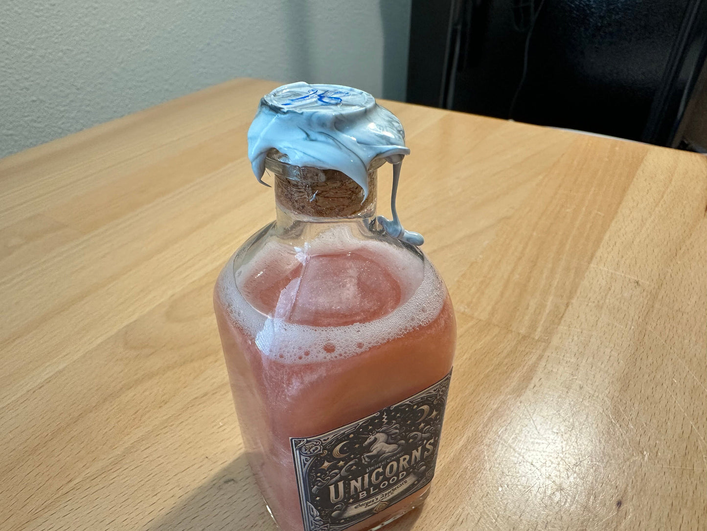 Unicorn Blood: A Potion of Essence - Enigmatic Silver-Red Swirling Decor Vial by Gorgon's Apothecary