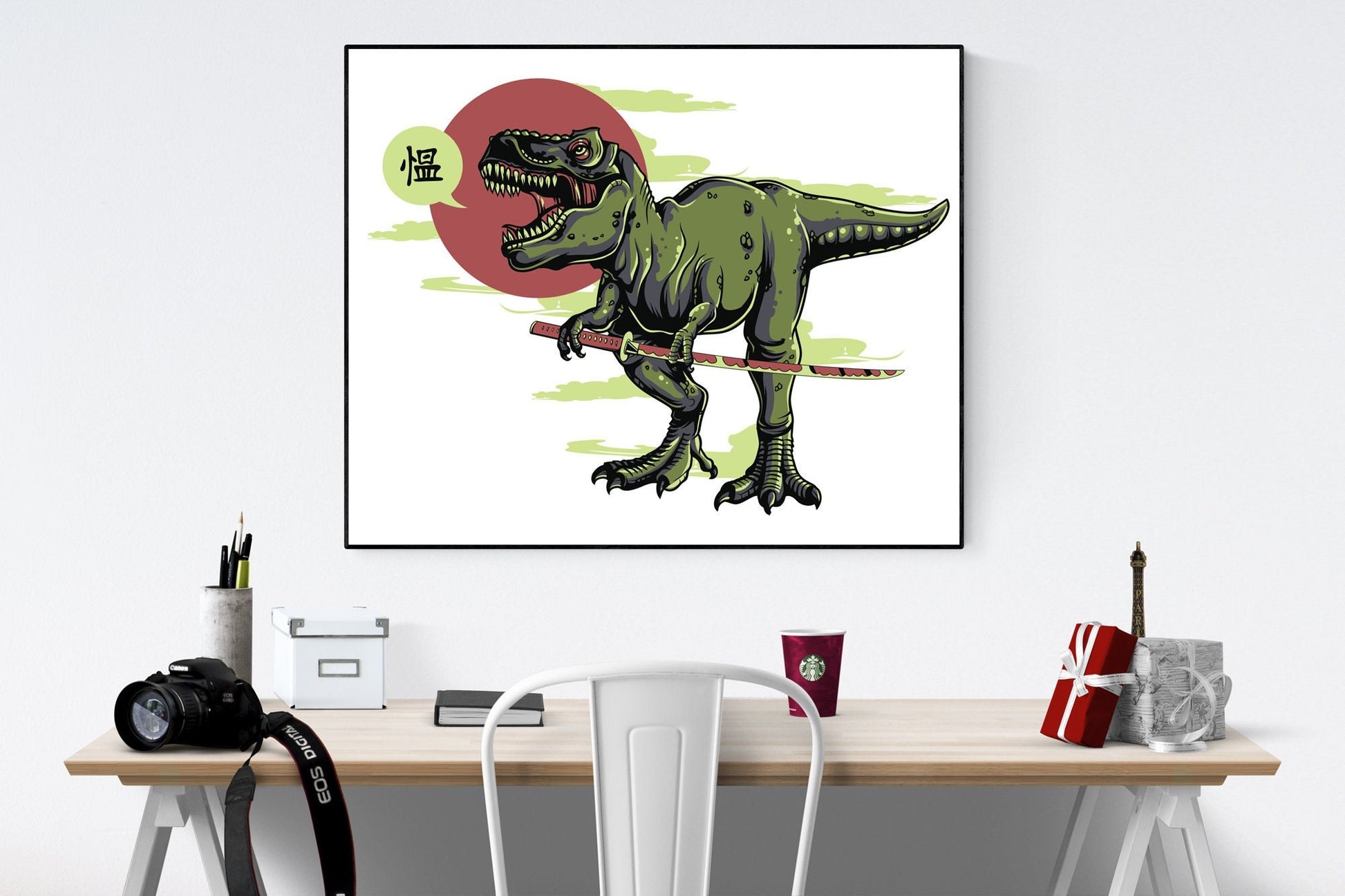 May include: A framed illustration of a green dinosaur holding a red katana sword. The dinosaur is facing the right side of the image. The dinosaur has a red mouth and white teeth. The dinosaur is standing on a white background with a red circle and green clouds behind it. The text &#39;僪&#39; is in a speech bubble above the dinosaur&#39;s head.