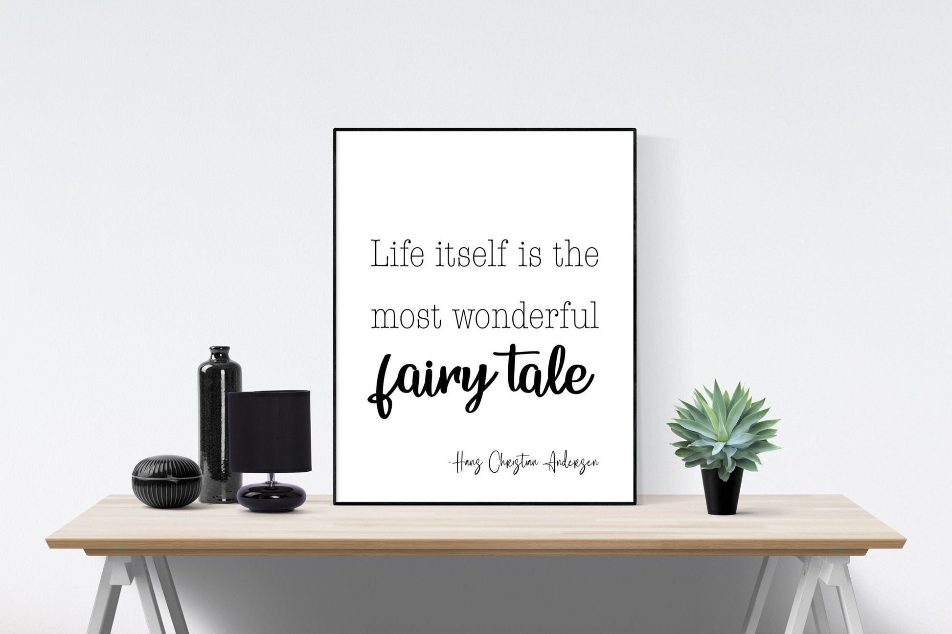 May include: A black and white printable quote with the text 'Life itself is the most wonderful fairy tale - Hans Christian Andersen' on a white background.