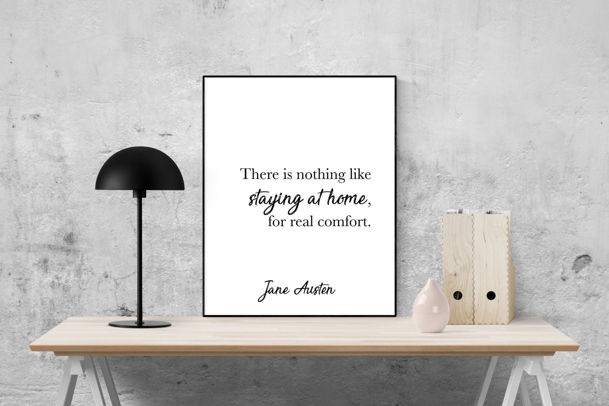 May include: A black and white printable quote poster with the text 'There is nothing like staying at home, for real comfort. Jane Austen'.