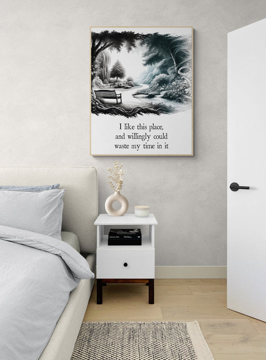 May include: A white nightstand with a drawer and a shelf. The nightstand has a black knob on the drawer and is sitting on a light brown wood floor. A book is on the shelf. A white vase with dried flowers is on the top shelf. A framed black and white drawing of a park scene with a bench and a path is hanging on the wall behind the nightstand. The drawing has text that reads: 'I like this place, and willingly could waste my time in it.'