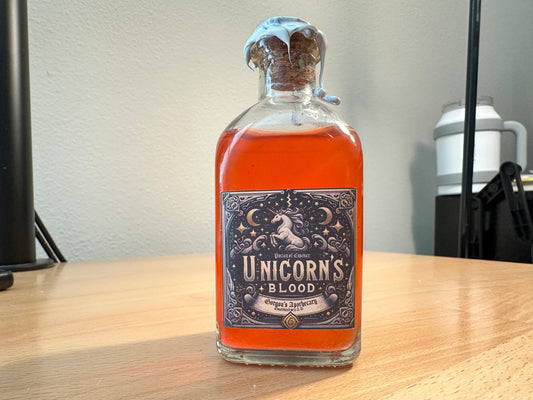 Unicorn Blood: A Potion of Essence - Enigmatic Silver-Red Swirling Decor Vial by Gorgon's Apothecary